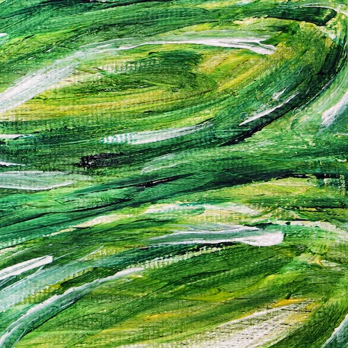 Swirls of green paint on canvas